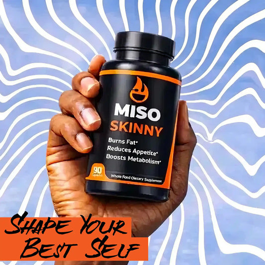 Hand holding a bottle of MISO SKINNY supplement with a wavy blue and white background.